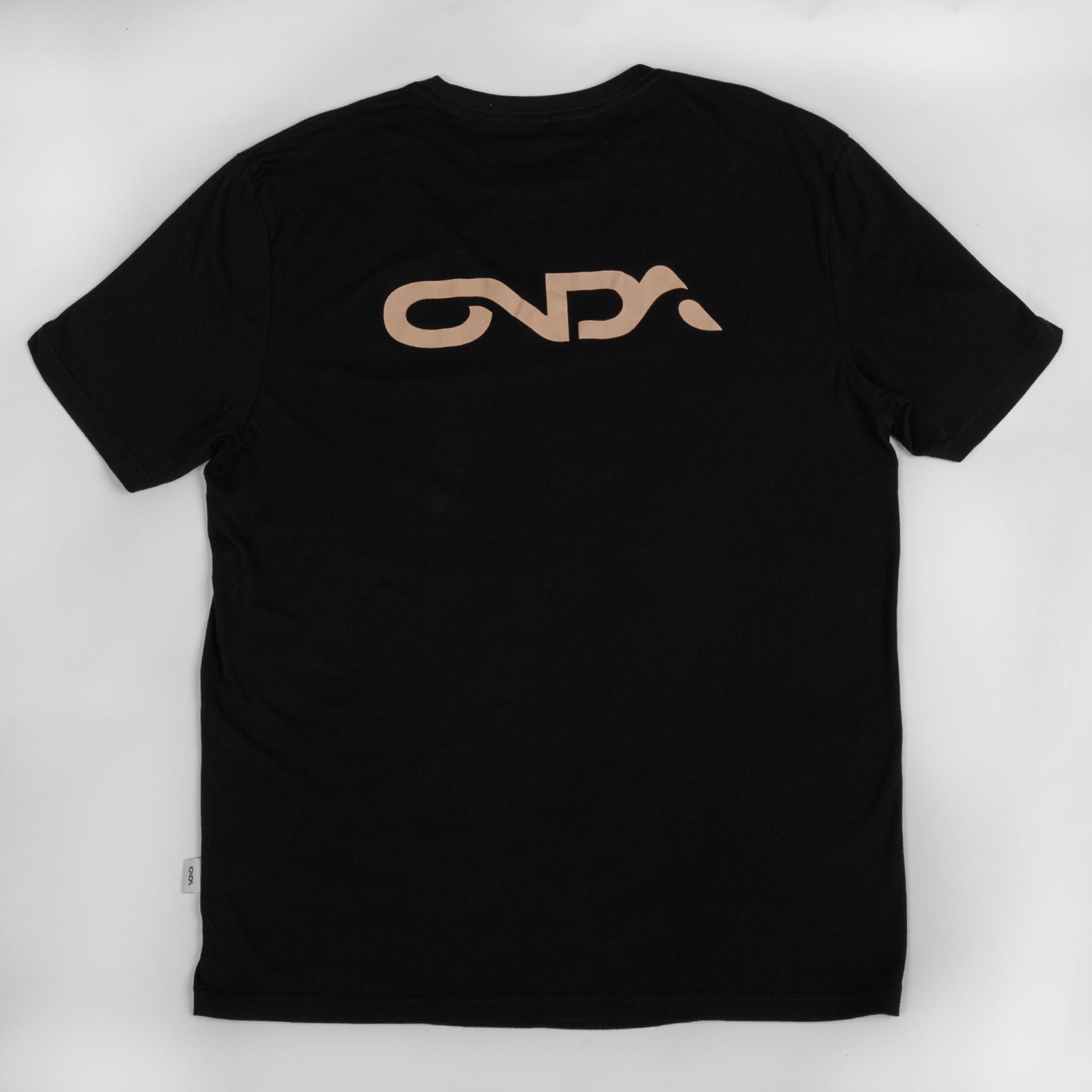 Black t-shirt with a gold onda logo on the back against a white background