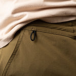 Close-up of brown shorts with an elastic band