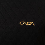 Gold onda logo on a black textured background