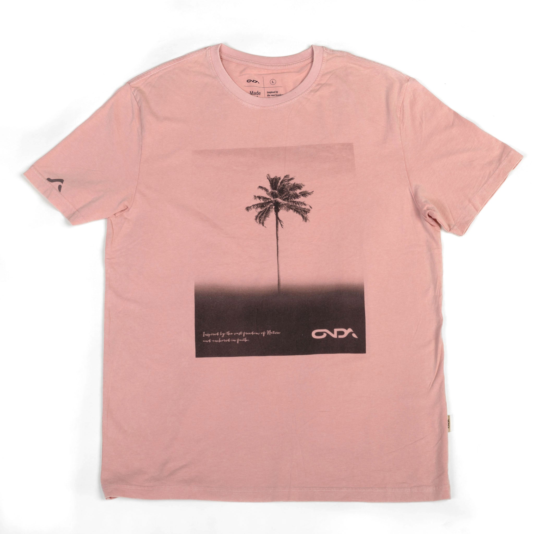 Pink t-shirt with palm tree graphic and brand logo on a white background